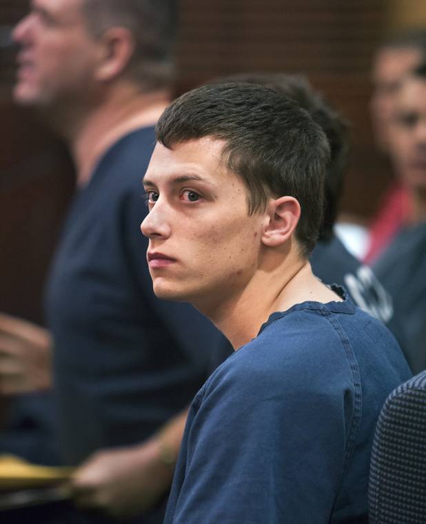 Colin Lowrey sits amongst other inmates as he awaits a bail hearing in Henderson Justice Court on Wednesday, Nov. 6, 2013.